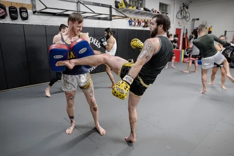 Muay Thai pad work at Victorious MMA Troy Michigan