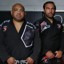 Professor Walter 'Cascao' Vitale and Professor Victor Torres in matching Cascao Jiu-Jitsu gis